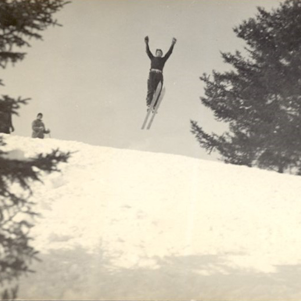 Historic Photo from the Ski Bowl, Featuring a Skier jumping